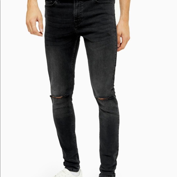 black ripped spray on skinny jeans